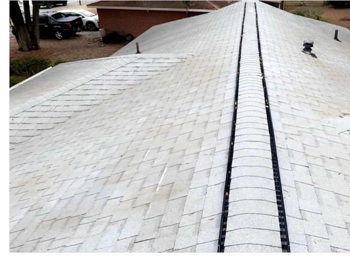Moss-free asphalt shingle roof after soft-wash cleaning